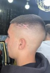 עיצוב שיער עם סמל מעוצב - Creative hair design at Yaniv Iluz Barber Shop